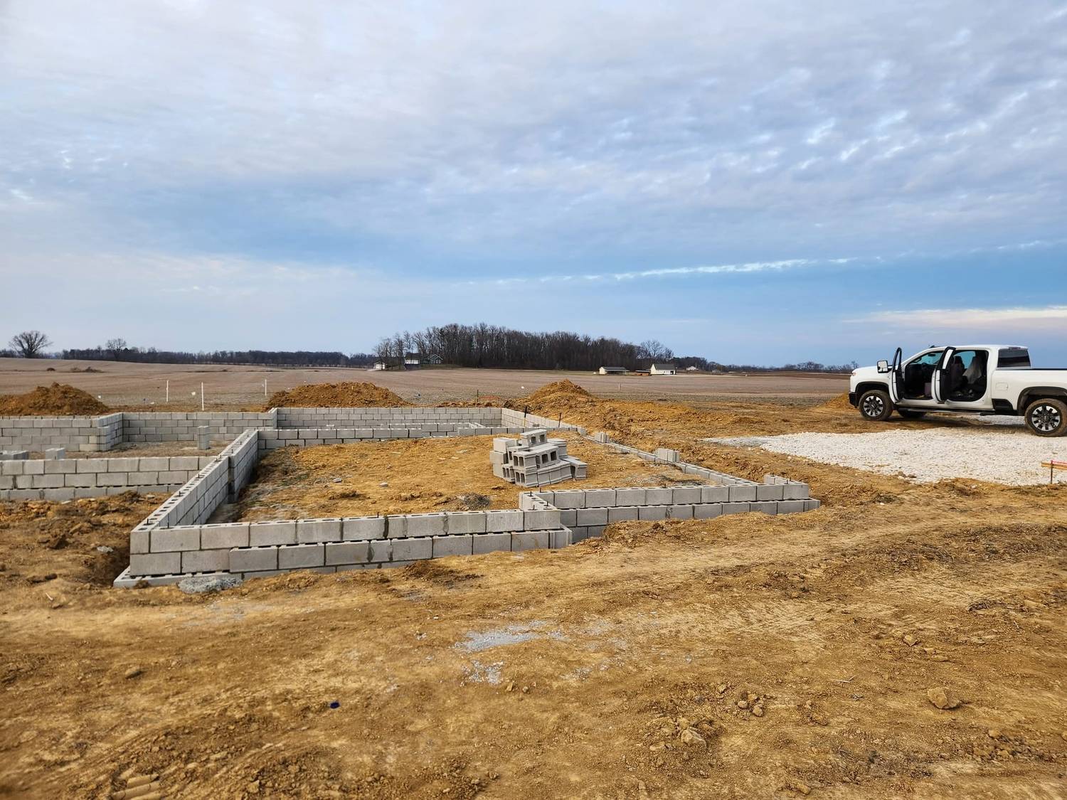 Block foundation walls for a custom home on a rural lot